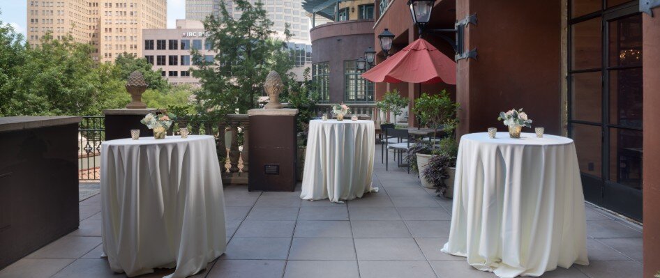 Cocktail reception setup on the balcony at Hotel Valencia Riverwalk