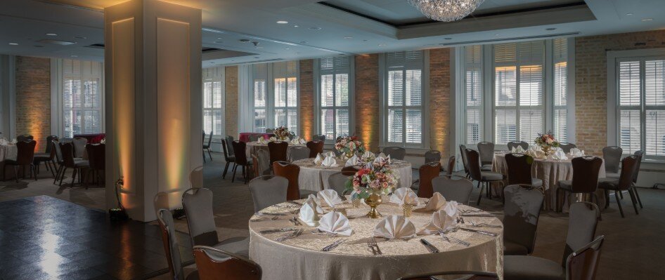 Dinner reception setup in ballroom