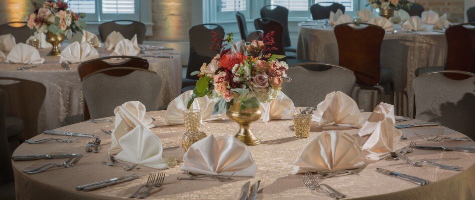 Close up of round table set for dinner reception