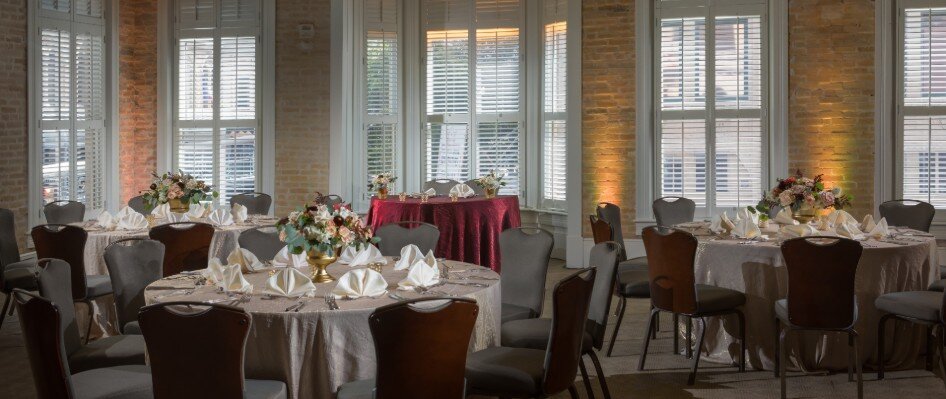 Wedding reception round table setup in the ballroom